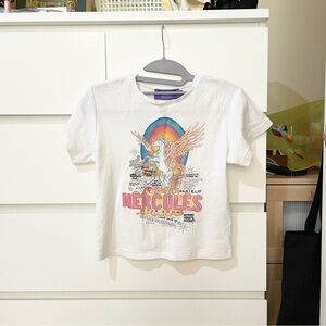 Realisation par Elton John Hercules tee
